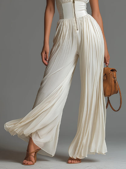 White sleeveless V-neck jumpsuit, zipper, pleated, wide chiffon legs